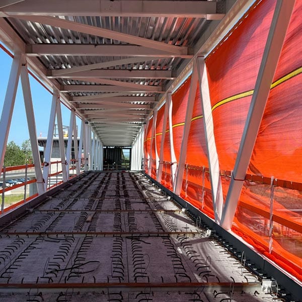 TallRail protecting a pedestrian overpass during construction.